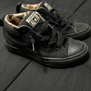 Converse All Star Boys size 11 black with camouflage inside of the shoes